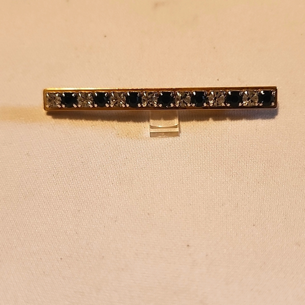 Gold-colored straight blue and white rhinestone pin brooch